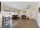 Bright Gathering room featuring hardwood floors and sliding glass doors at 4607 Masefield Pl, Sarasota, FL 34241
