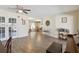 Open living area with tile flooring, French doors, and a view to the dining area at 4607 Masefield Pl, Sarasota, FL 34241