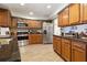 Recently remodeled kitchen, boasts stainless steel appliances and granite counters at 4607 Masefield Pl, Sarasota, FL 34241