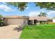 Single-story home with stone exterior and attached garage at 4607 Masefield Pl, Sarasota, FL 34241