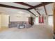 Spacious living area with exposed wooden beams and plush seating at 4607 Masefield Pl, Sarasota, FL 34241