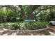 Melwood Oaks community entrance, lush landscaping at 3712 3Rd W Ave, Palmetto, FL 34221