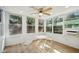 Sunroom with white table and chairs, perfect for relaxing at 3712 3Rd W Ave, Palmetto, FL 34221