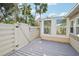 Private deck with a gate leading to the backyard at 3712 3Rd W Ave, Palmetto, FL 34221