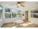 Sunroom with white table and chairs and access to the outdoors at 3712 3Rd W Ave, Palmetto, FL 34221