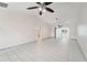 Spacious living room with tile floors and ceiling fan at 3712 3Rd W Ave, Palmetto, FL 34221