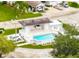 Community pool with adjacent patio and restrooms at 3712 3Rd W Ave, Palmetto, FL 34221