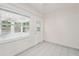 Sunroom with a door leading to the backyard at 3712 3Rd W Ave, Palmetto, FL 34221