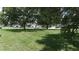 Community park with picnic table and lush trees at 3712 3Rd W Ave, Palmetto, FL 34221