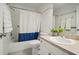 Clean bathroom with shower/tub combo, updated vanity, and neutral decor at 3712 3Rd W Ave, Palmetto, FL 34221