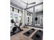 Home gym with Peloton bike and yoga mats at 1158 Blue Shell Loop, Sarasota, FL 34240