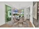 Bright dining room with pool view and sliding glass doors at 11414 Brightly Dr, Venice, FL 34293