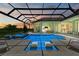 Inviting, refreshing pool with a covered patio and spa at 11414 Brightly Dr, Venice, FL 34293