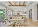 Living room with kitchen and neutral decor, hardwood floors at 11414 Brightly Dr, Venice, FL 34293