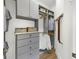 Organized and closet with custom shelving and hanging space at 11414 Brightly Dr, Venice, FL 34293