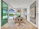 Bright dining room with pool view and sliding glass doors at 11414 Brightly Dr, Venice, FL 34293