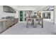 Covered patio with an outdoor kitchen and bar seating at 11414 Brightly Dr, Venice, FL 34293