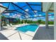 Inviting, refreshing pool with a covered patio and spa at 11414 Brightly Dr, Venice, FL 34293