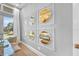 Stylish home office with a wall of mirrors reflecting light into the room at 11414 Brightly Dr, Venice, FL 34293