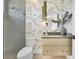 Stylish bathroom with patterned tile and modern vanity at 11414 Brightly Dr, Venice, FL 34293
