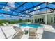Inviting, refreshing pool with a covered patio and spa at 11414 Brightly Dr, Venice, FL 34293