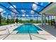 Inviting, refreshing pool with a covered patio and spa at 11414 Brightly Dr, Venice, FL 34293