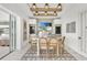 Wet bar with TV and stylish barstools, near outdoor space at 11414 Brightly Dr, Venice, FL 34293
