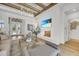 Bright living room features hardwood floors, a fireplace, and access to the backyard at 11414 Brightly Dr, Venice, FL 34293