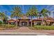 Community clubhouse with Mediterranean style and landscaping at 13514 Messina Loop # 102, Bradenton, FL 34211