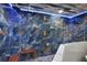 Large walk-in shower with blue marble tile and dual shower heads at 3500 El Conquistador Pkwy # 339, Bradenton, FL 34210