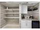 Well-organized pantry with ample shelving and wine rack at 3500 El Conquistador Pkwy # 339, Bradenton, FL 34210