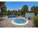 Relaxing community hot tub adjacent to the refreshing swimming pool at 3500 El Conquistador Pkwy # 339, Bradenton, FL 34210