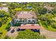 Aerial view of building with carport and surrounding landscape at 3500 El Conquistador Pkwy # 339, Bradenton, FL 34210