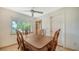 Formal dining area with ornate table and chairs at 8245 Longbay Blvd, Sarasota, FL 34243