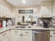 Well-equipped kitchen featuring granite countertops and updated cabinetry at 4427 Longmeadow # 48, Sarasota, FL 34235