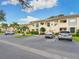 Community features ample parking and well-maintained landscaping at 4427 Longmeadow # 48, Sarasota, FL 34235