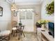 Bright kitchen nook with a small table and chairs, perfect for casual dining at 4427 Longmeadow # 48, Sarasota, FL 34235