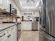 Updated kitchen with stainless steel appliances and granite countertops at 4427 Longmeadow # 48, Sarasota, FL 34235