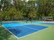 Two well-maintained pickleball courts at 4427 Longmeadow # 48, Sarasota, FL 34235