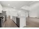 Modern kitchen with island and stainless steel appliances at 15425 White Linen Dr, Bradenton, FL 34211