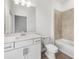 Modern bathroom with white vanity and bathtub at 15425 White Linen Dr, Bradenton, FL 34211