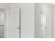 Bright hallway with white doors and carpet at 15425 White Linen Dr, Bradenton, FL 34211