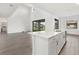 Open concept kitchen island with white quartz countertop at 15425 White Linen Dr, Bradenton, FL 34211