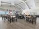 Large community dining room with bar and TVs at 15425 White Linen Dr, Bradenton, FL 34211