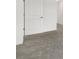 Simple hallway with carpet and white doors at 15425 White Linen Dr, Bradenton, FL 34211