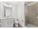 Clean bathroom with shower, toilet and white vanity at 15425 White Linen Dr, Bradenton, FL 34211