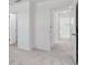 Hallway featuring carpeted flooring and doorways to other areas of the home at 3063 Novara Ln, Lakewood Ranch, FL 34211