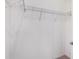Walk-in closet featuring metal shelving and light neutral carpeting at 3067 Novara Ln, Lakewood Ranch, FL 34211