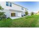 Private backyard with patio and grassy area at 3145 Novara Ln, Lakewood Ranch, FL 34211