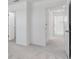 Bright hallway with access to bedrooms and closets at 3145 Novara Ln, Lakewood Ranch, FL 34211